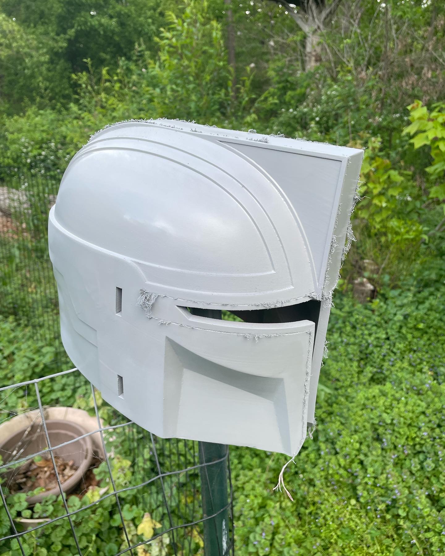 left profile view of the architect mando helmet after priming