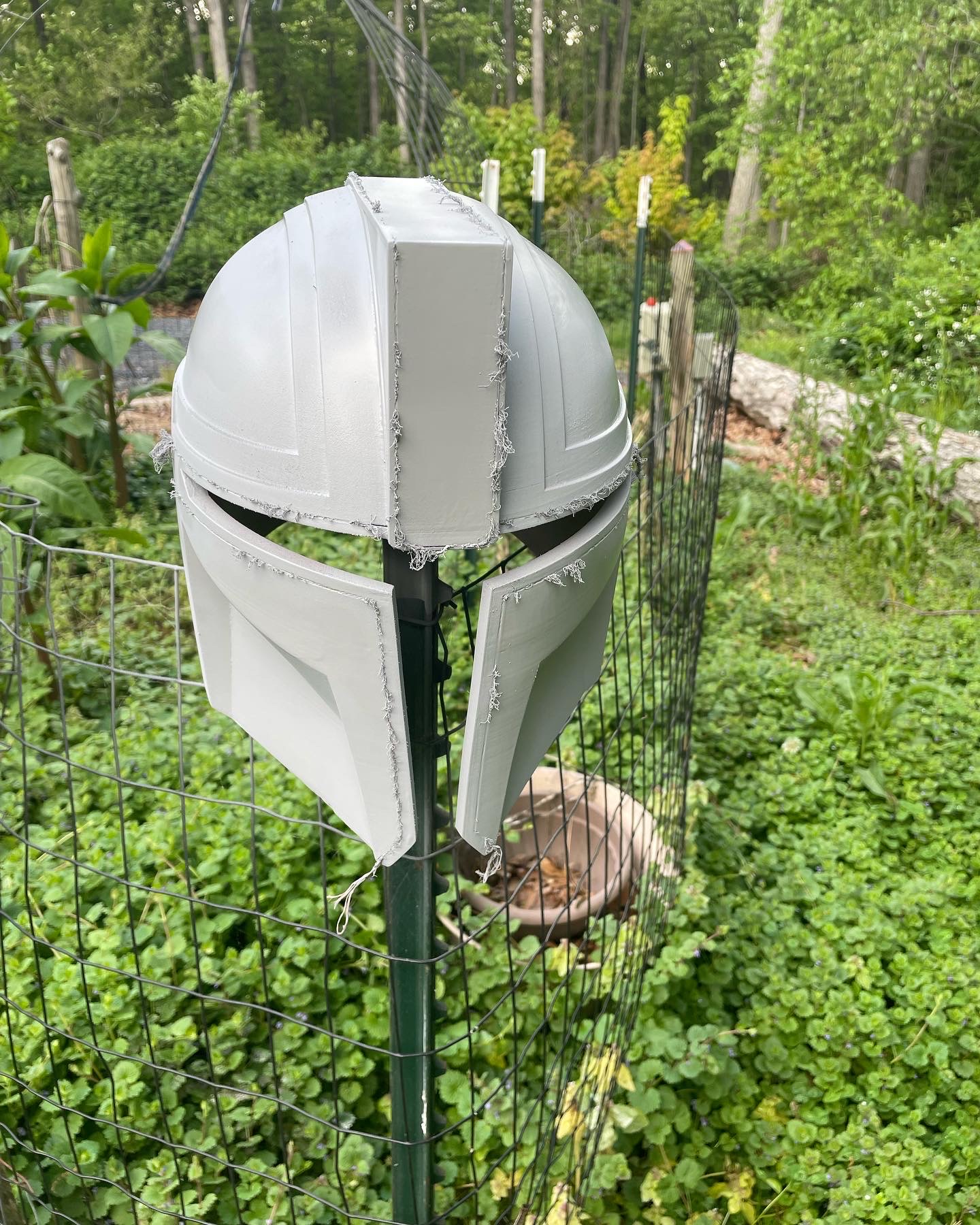 front view of the architect mando helmet after priming.